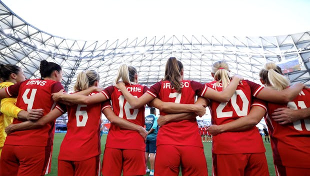 MARSEILLE, FRANCE - AUGUST 03: Players of Team Canada line up prior to the Women's Quarterfinal match between Canada and Germany during the Olympic Games Paris 2024 at Stade de Marseille on August 03, 2024 in Marseille, France. (Photo by Alex Livesey/Getty Images)