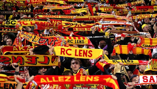 LENS, FRANCE - FEBRUARY 15: Fans of RC Lens during the UEFA Europa League 2023/24 Knockout Round Play-offs First Leg match between RC Lens and Sport-Club Freiburg at Stade Bollaert-Delelis on February 15, 2024 in Lens, France. (Photo by Alex Pantling/Getty Images)