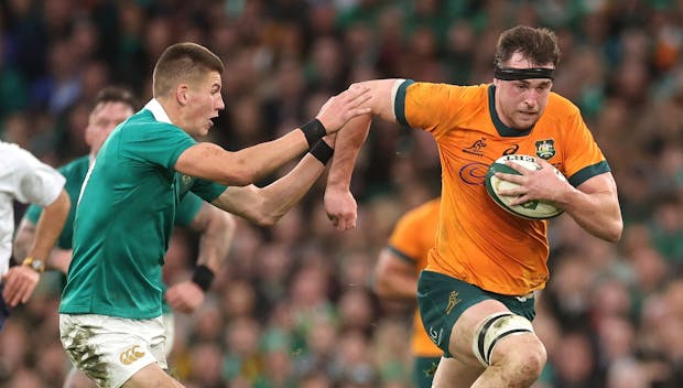 DUBLIN, IRELAND - NOVEMBER 30: Nick Frost of Australia goes past Sam Prendergast during the Autumn Nations Series 2024 match between Ireland and Australia at the Aviva Stadium on November 30, 2024 in Dublin, Ireland. (Photo by David Rogers/Getty Images)