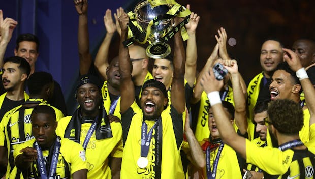 JEDDAH, SAUDI ARABIA - MAY 26: Ahmed Sharahili of Al-Ittihad lifts the Saudi Pro League trophy with teammates following the team's victory in the Saudi Pro League match between Al Ittihad and Damac FC at Alinma Stadium on May 26, 2025 in Jeddah, Saudi Arabia. (Photo by Yasser Bakhsh/Getty Images)